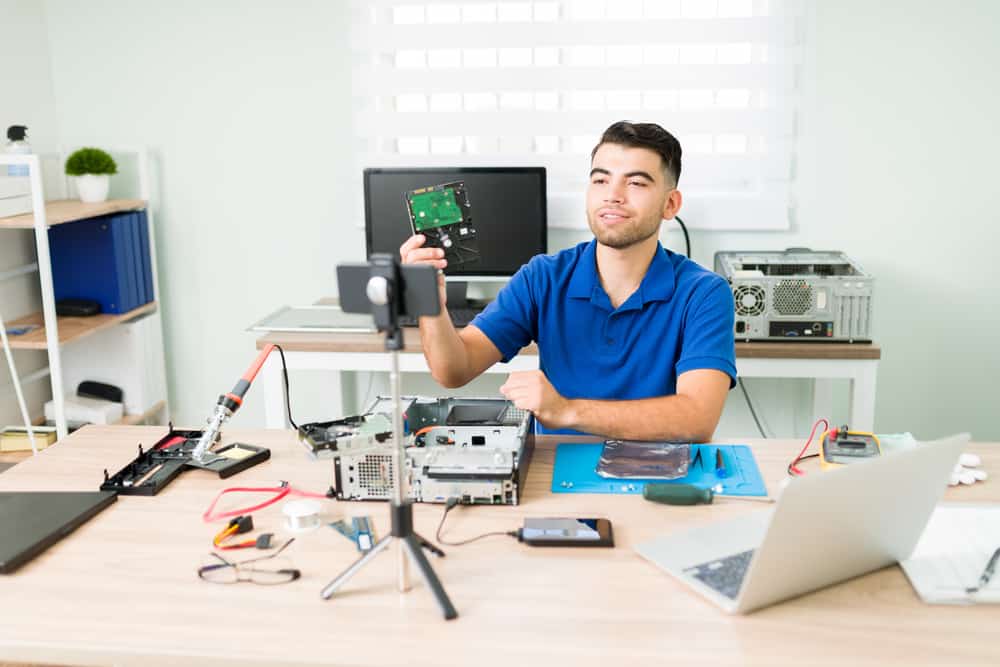 a man cleaning his PC