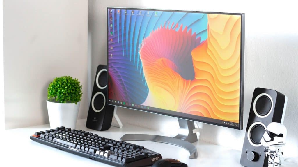 Monitor with keyboard and sound speaker